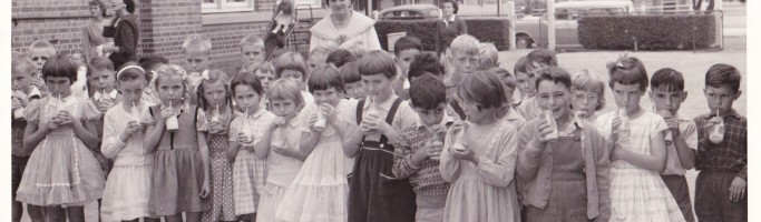 Children at the Ethelton Primary School drinking milk made available free by the school milk programme in the early 60s.