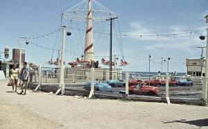 Photo from Holdfast Bay History Centre. The Glenelg sideshows, very popular spot during school holidays.