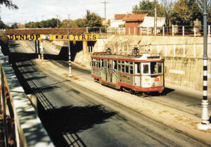 A tram goes through the Goodwood underpass