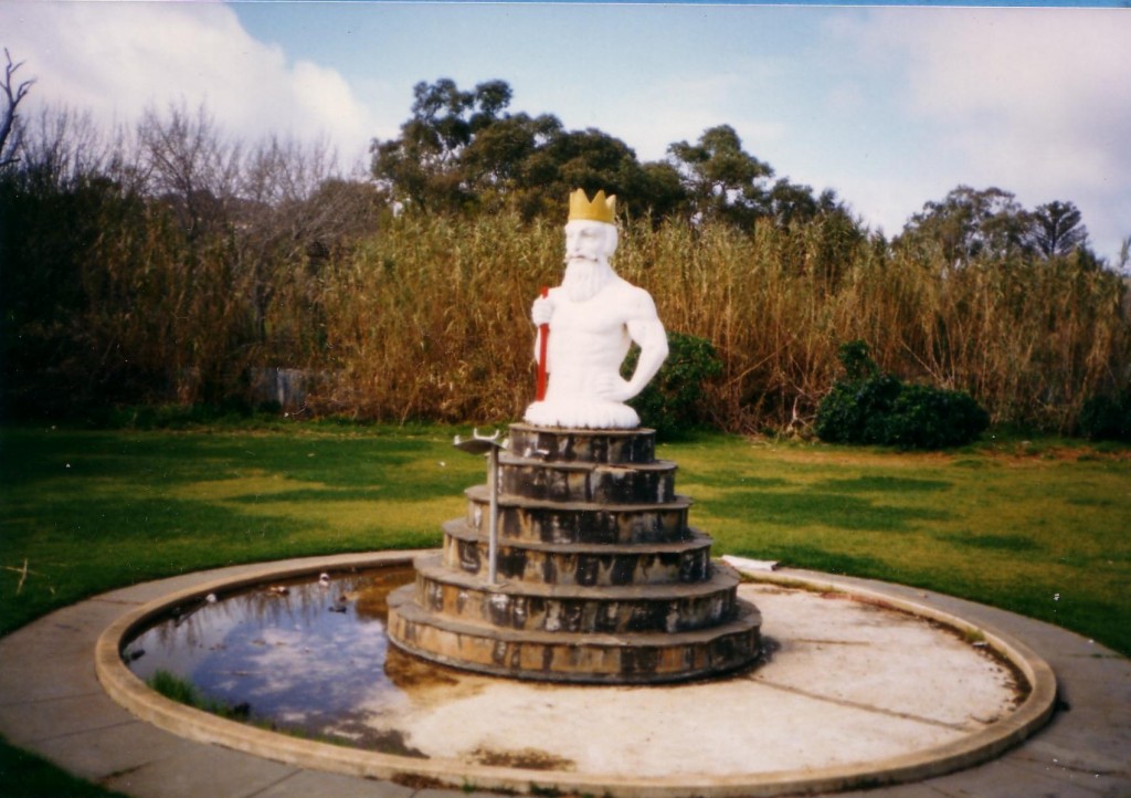 Photo of King Neptune in his original pond, comes from the personal collection of Suzanne Comelli, the daughter of Arturo who was the artisan who crafted Neptune from concrete, and 891 ABC Adelaide.