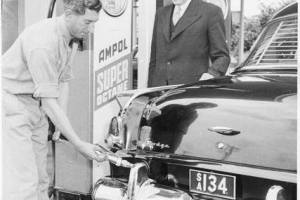 Photo from National Library of Australia; nla.pic-an 24679811-v.•	The Lord Mayor of Adelaide, Mr. J.S. Philp, watches Frank Patten of the Beulah Park Ampol service station refuel his car during the Handicapped Children's Week Appeal, South Australia, December, 1955 [picture]  