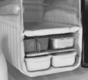 Photo from Google Images. Early fridges had a small freezer compartment big enough for an Amscol brick of ice cream and needed defrosting regularly.