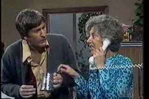 Photo from You Tube. Ross Higgins as Ted and Judi Farr as his poor long suffering wife Thelma. 