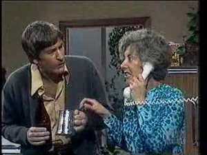 Photo from You Tube. Ross Higgins as Ted and Judi Farr as his poor long suffering wife Thelma. 