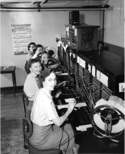 Photo from Google Images. Manual switchboard operators at work in 1952