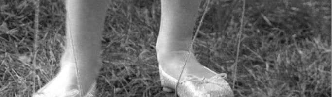 Games We Used to Play. Photo from Google Images. A length of thin rope attached to the same cans would turn them into a pair of stilts.