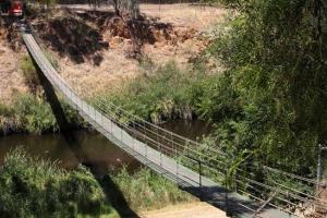 A property developer built the bridge so St Peters residents could cross the river to access his land sale and catch the Walkerville tram