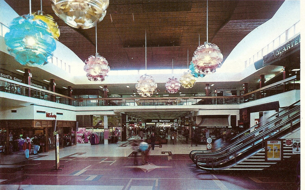 Photo from Glen H Flickr Photostream. Marion Shopping Centre in 1974 with the escalators to the Quaterdeck and John Martin's Department Store