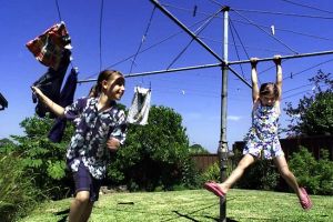 Photo from News Ltd. Remember going for a swing or a ‘whizzy’ with siblings or friends, on mum’s Hills Hoist clothes line.  