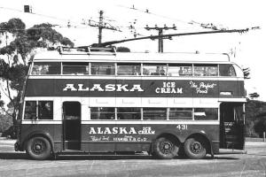 Photo from Wikipedia Commons. Double Decker Trolley Bus 1940s showing the front and rear entrances. Love the old advertising for Alaska Ice Cream, The Perfect Food!